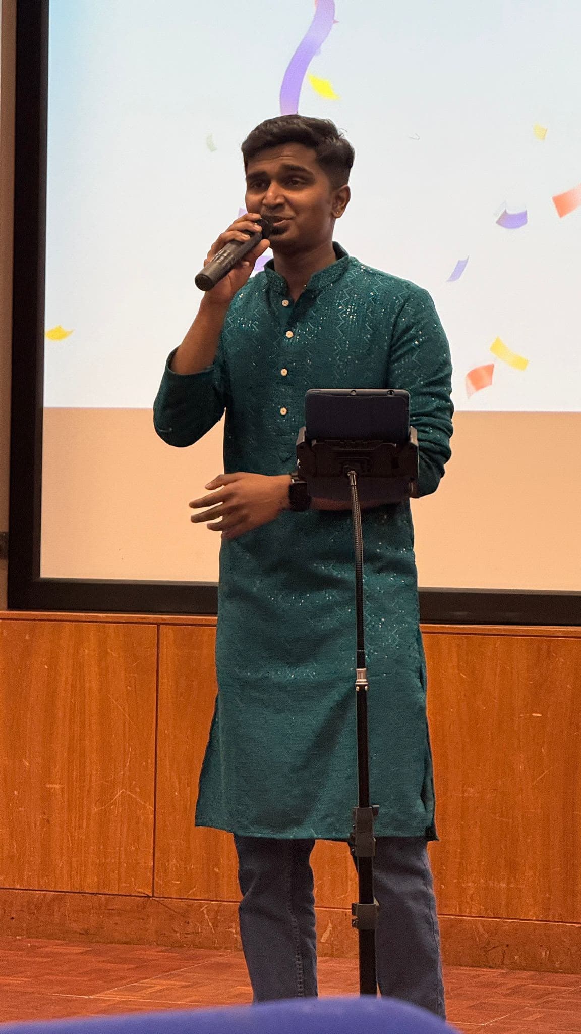 Young community member speaking at an event